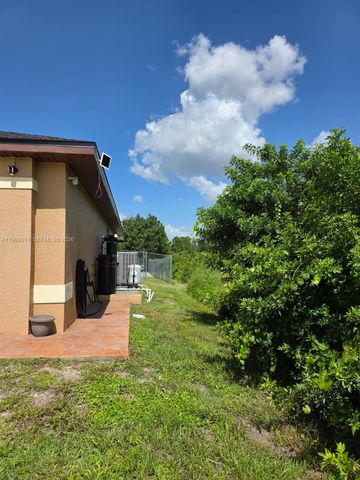 1816 Tomaso Avenue, Lehigh Acres, FL 33972