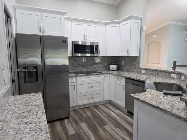 1816 Tomaso Avenue, Lehigh Acres, FL 33972