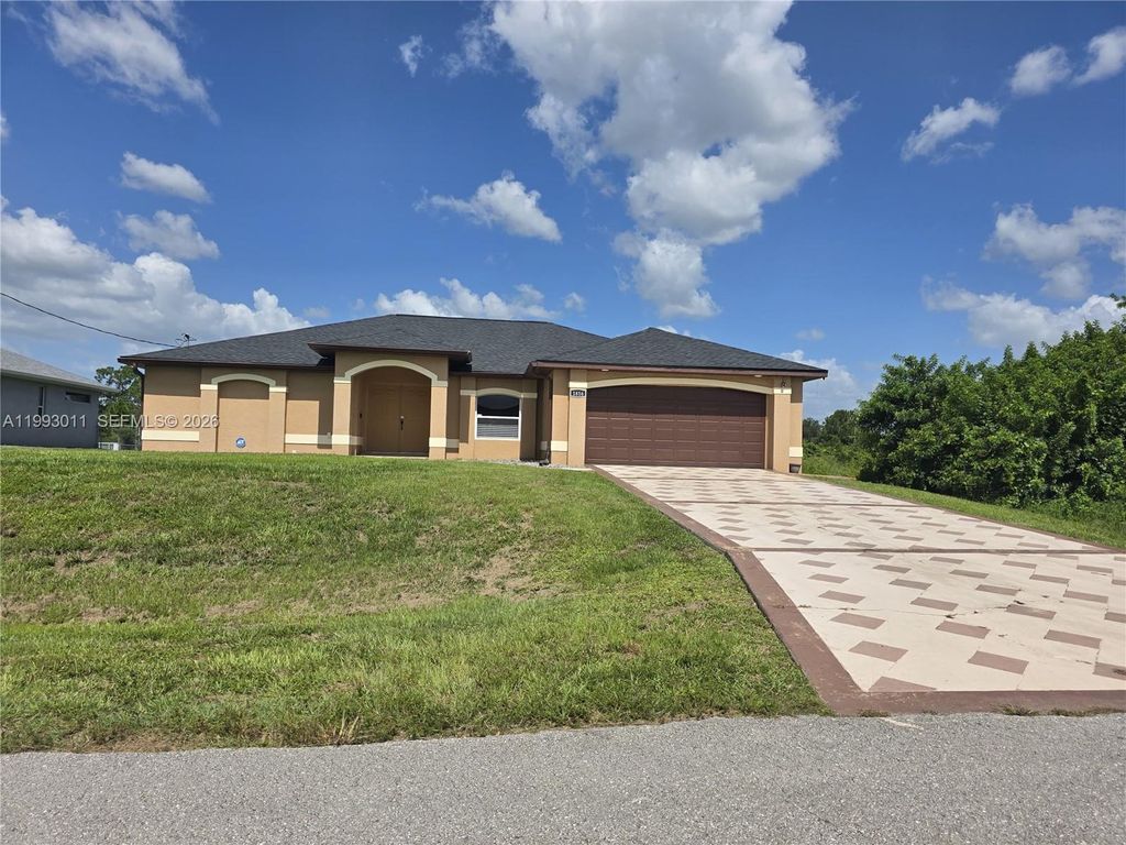 1816 Tomaso Avenue, Lehigh Acres, FL 33972