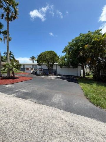 3040 TROPICAL Trail, Lake Worth, FL 33462