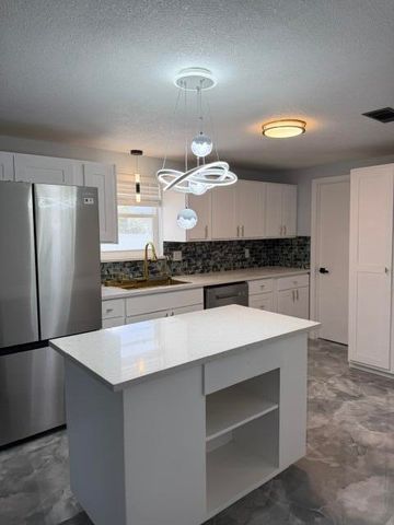3040 TROPICAL Trail, Lake Worth, FL 33462