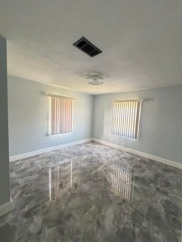 3040 TROPICAL Trail, Lake Worth, FL 33462
