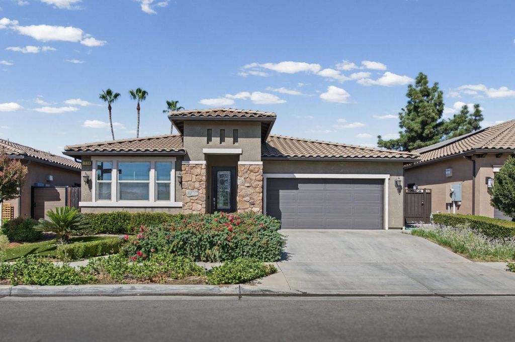 Image 1 of property listing at 1728 E Green Sage Avenue, Fresno, CA 93730