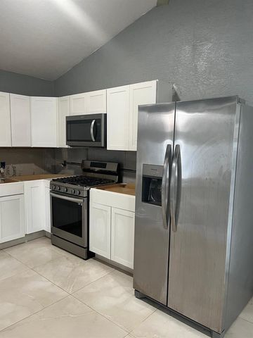 219 NW Biltmore Street, Port St. Lucie, FL 34983