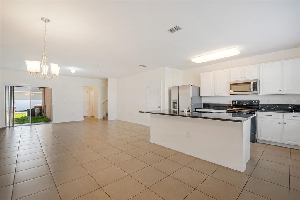 Image 4 of property listing at 1404 DUSTY STONE LANE, Kissimmee, FL 34744