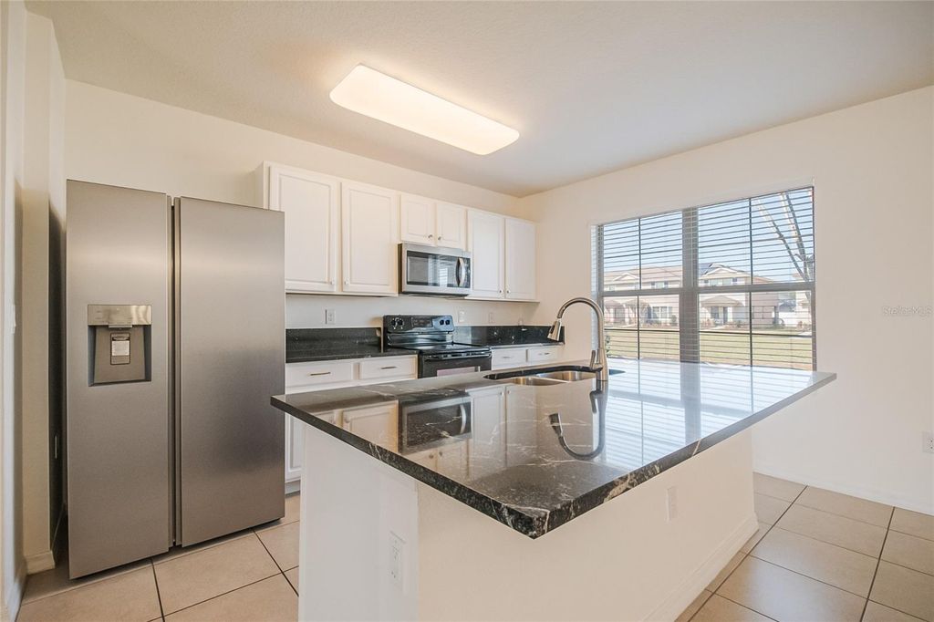 Image 7 of property listing at 1404 DUSTY STONE LANE, Kissimmee, FL 34744
