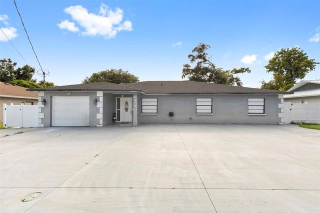 6920 N CAMERON AVENUE, Tampa, FL 33614