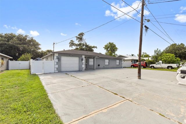 6920 N CAMERON AVENUE, Tampa, FL 33614