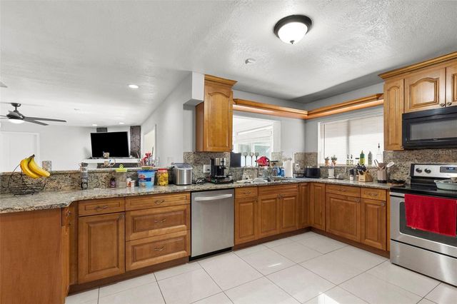 6920 N CAMERON AVENUE, Tampa, FL 33614