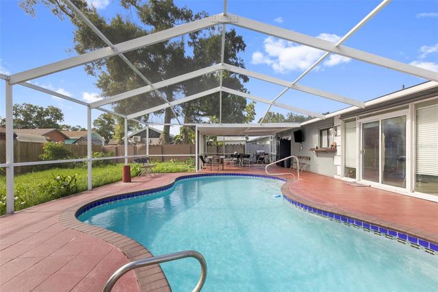 6920 N CAMERON AVENUE, Tampa, FL 33614