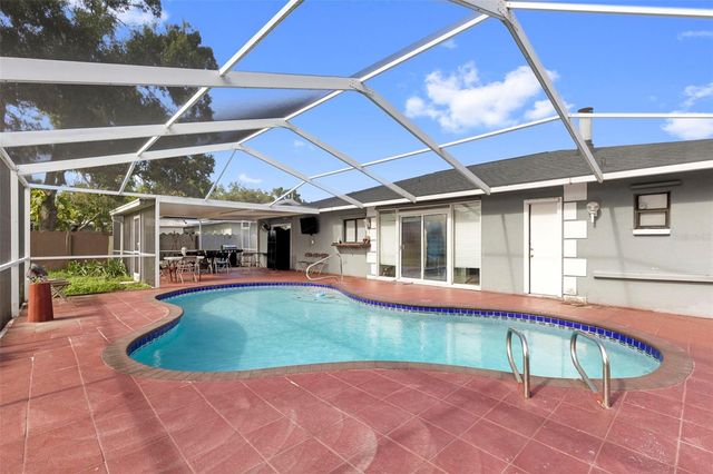 6920 N CAMERON AVENUE, Tampa, FL 33614