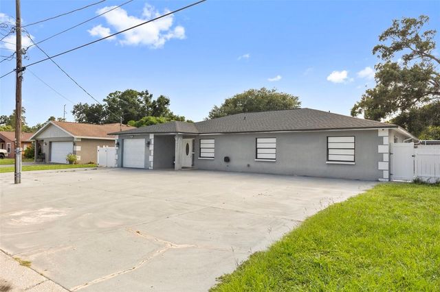 6920 N CAMERON AVENUE, Tampa, FL 33614