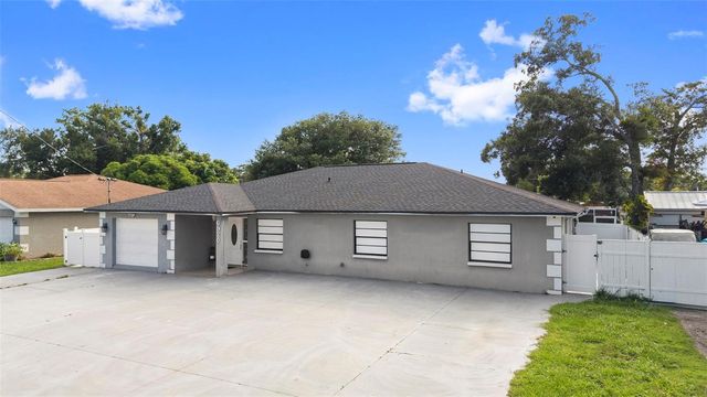 6920 N CAMERON AVENUE, Tampa, FL 33614