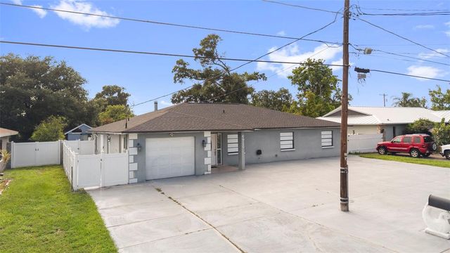 6920 N CAMERON AVENUE, Tampa, FL 33614