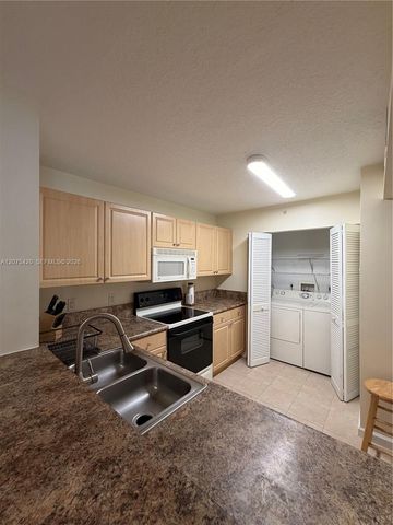 619 E Sheridan Street 105, Dania Beach, FL 33004