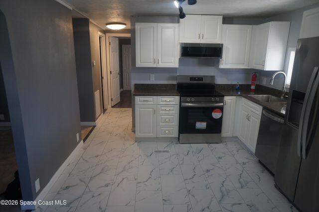 1805 Big Cypress Street NE, Palm Bay, FL 32905