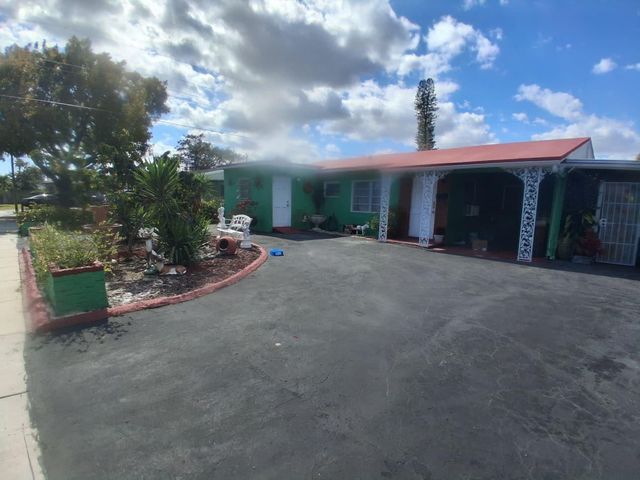 6031 NE 7th Avenue, Oakland Park, FL 33334