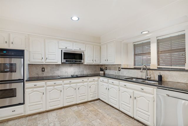 9 Stillwaters Drive, Heath, TX 75032