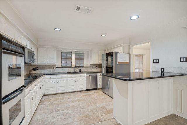 9 Stillwaters Drive, Heath, TX 75032