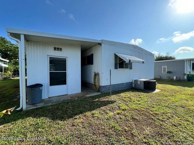 1005 Thrush Circle, Barefoot Bay, FL 32976