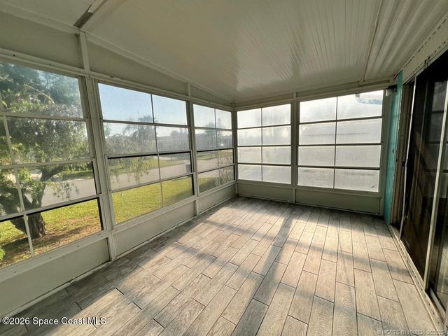 1005 Thrush Circle, Barefoot Bay, FL 32976