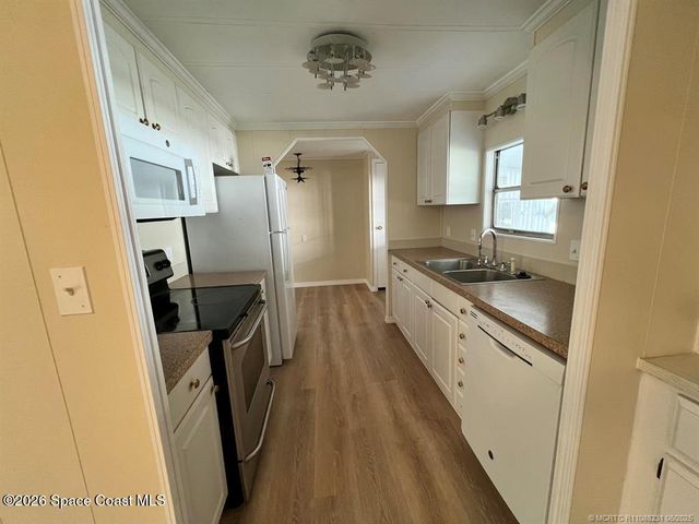 1005 Thrush Circle, Barefoot Bay, FL 32976