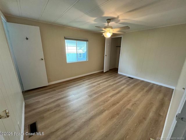 1005 Thrush Circle, Barefoot Bay, FL 32976