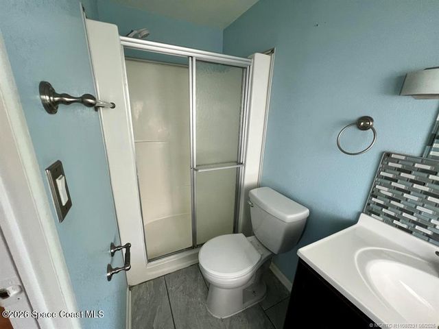 1005 Thrush Circle, Barefoot Bay, FL 32976