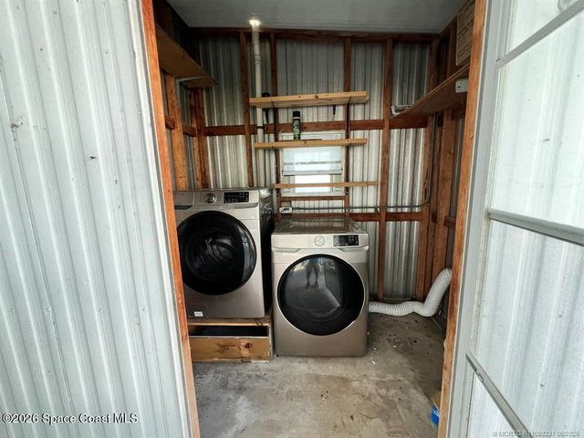 1005 Thrush Circle, Barefoot Bay, FL 32976