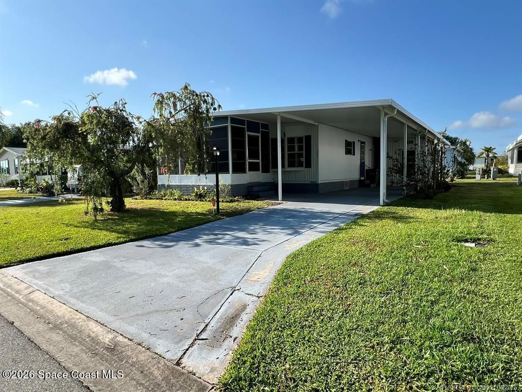 1005 Thrush Circle, Barefoot Bay, FL 32976