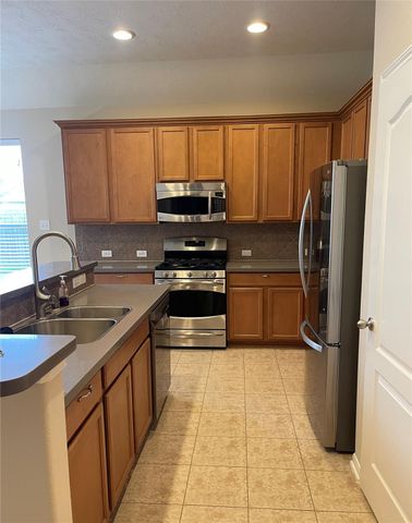 21839 Leigh Creek Drive, Spring, TX 77388