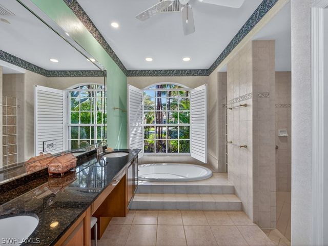 5839 Whisperwood CT, Naples, FL 34110