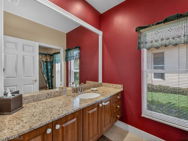 5839 Whisperwood CT, Naples, FL 34110