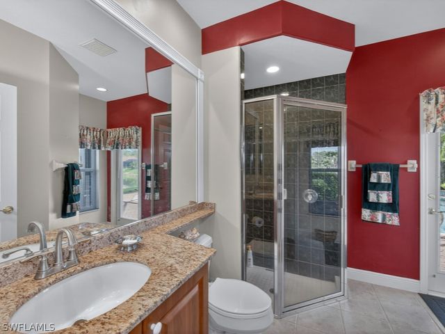 5839 Whisperwood CT, Naples, FL 34110