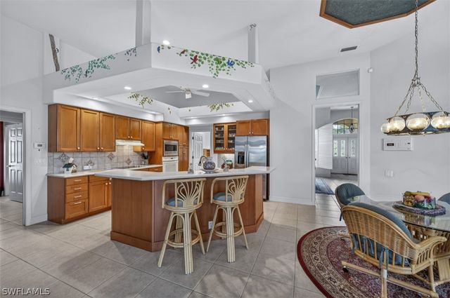 5839 Whisperwood CT, Naples, FL 34110