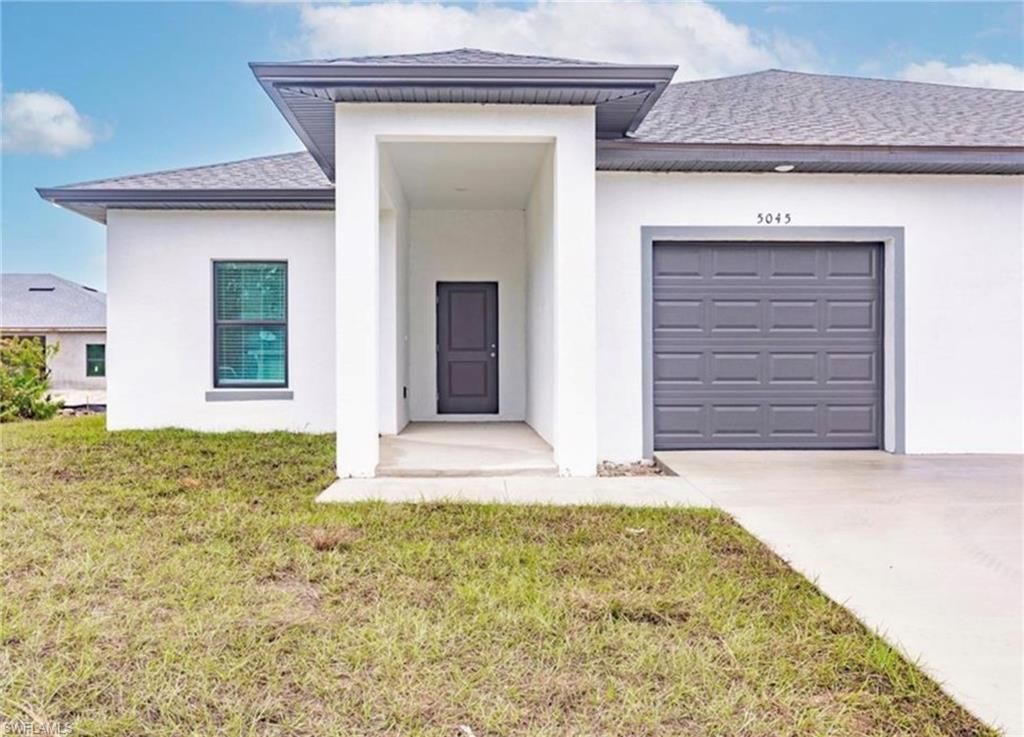 5045-5047 Locke LN, LEHIGH ACRES, FL 33973 — photo 2