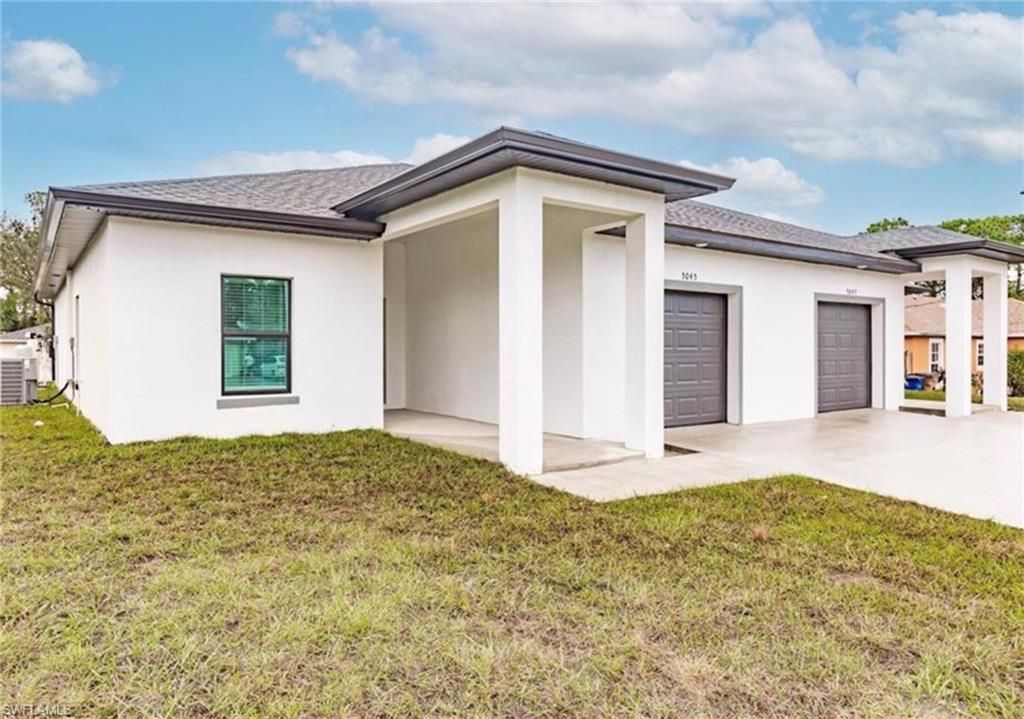 5045-5047 Locke LN, LEHIGH ACRES, FL 33973 — photo 3
