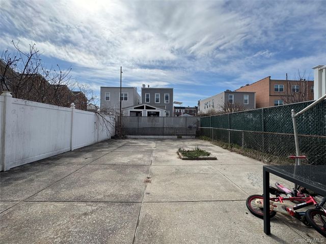 7330 67th Drive, Middle Village, NY 11379