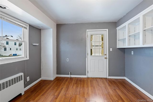 22 Woodcrest Road, Hicksville, NY 11801