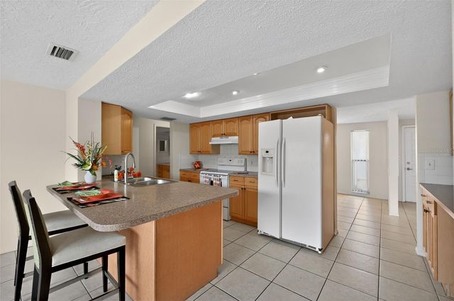 1037 TAMARAC DRIVE, Holiday, FL 34690