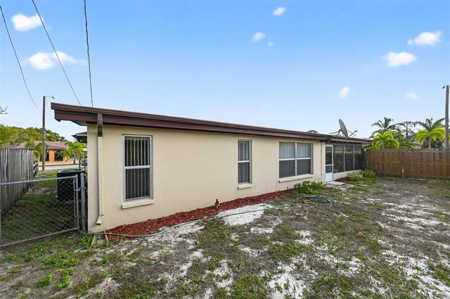 1037 TAMARAC DRIVE, Holiday, FL 34690