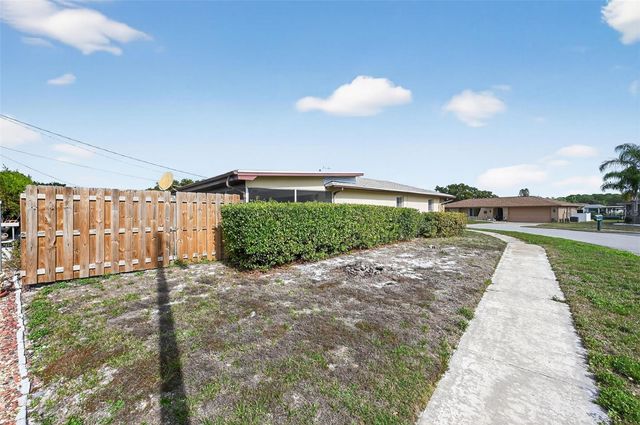 1037 TAMARAC DRIVE, Holiday, FL 34690