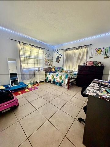 419 GLENWOOD Drive, West Palm Beach, FL 33415