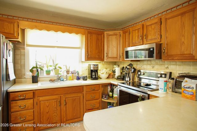 222 Dawn Court, Potterville, MI 48876