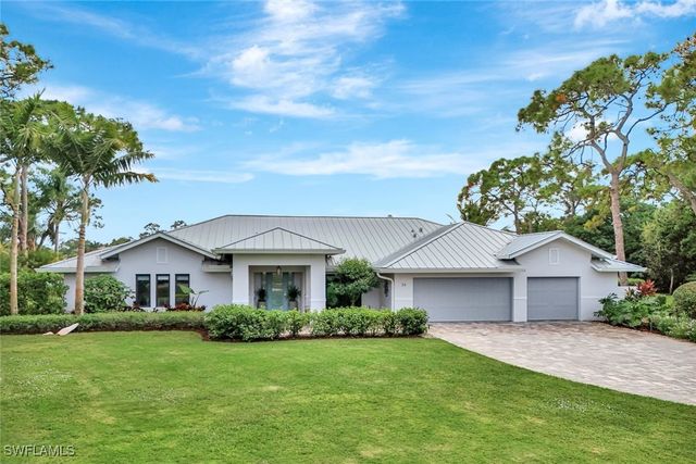 36 Cajeput DR, Naples, FL 34108
