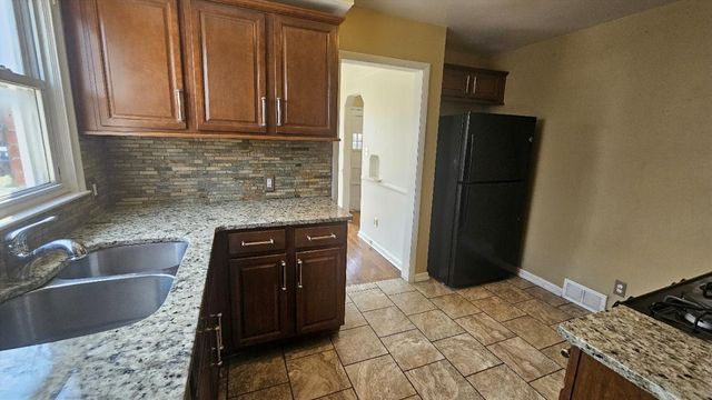 21345 Newcastle Road, Harper Woods City, MI 48225