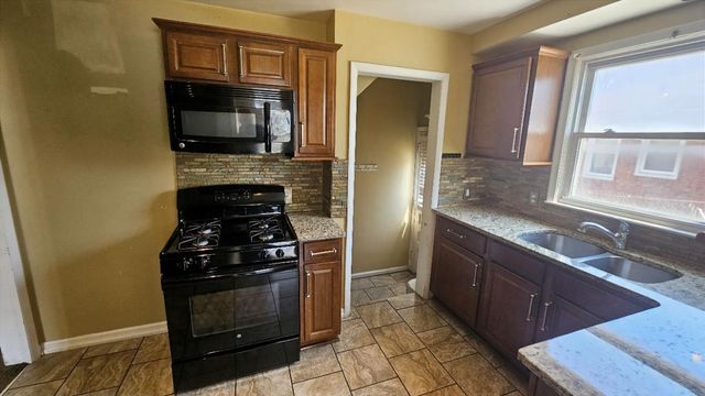 21345 Newcastle Road, Harper Woods City, MI 48225