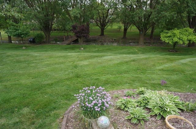 49954 Willowood Drive, Macomb, MI 48044