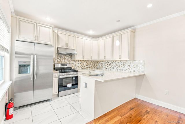 9511 92nd Street, Ozone Park, NY 11416
