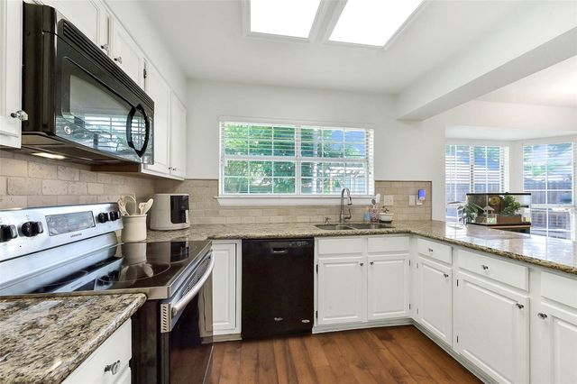 17214 Palm Falls Court, Houston, TX 77095